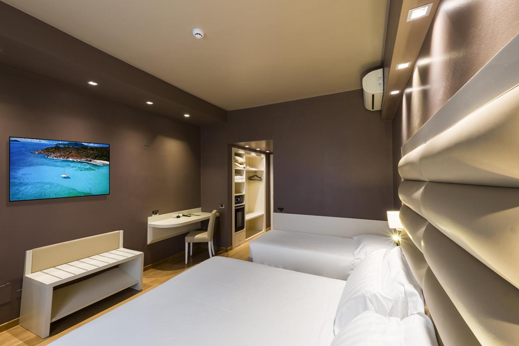 Hotel Touring Ferrara Pokoj fotografie