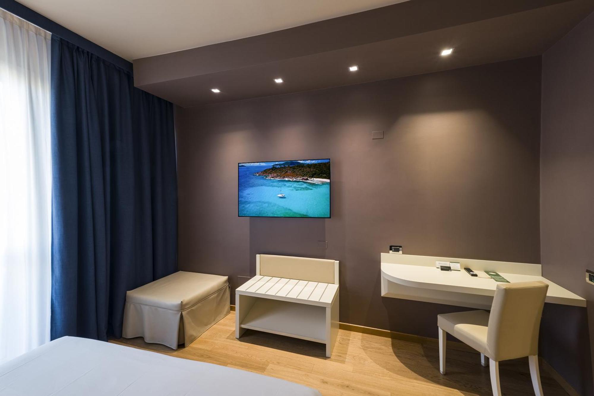 Hotel Touring Ferrara Pokoj fotografie